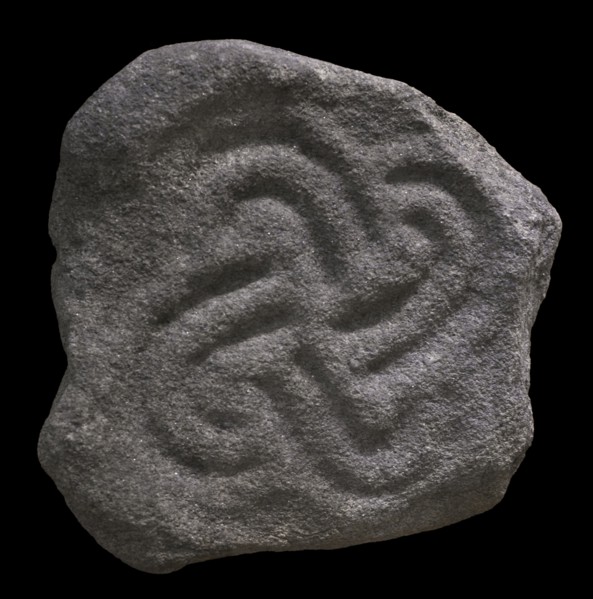 Architectural element depicting a tetraskelion.