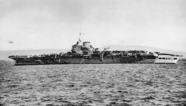 Aircraft Carrier H.M.S. Victorious at anchor.