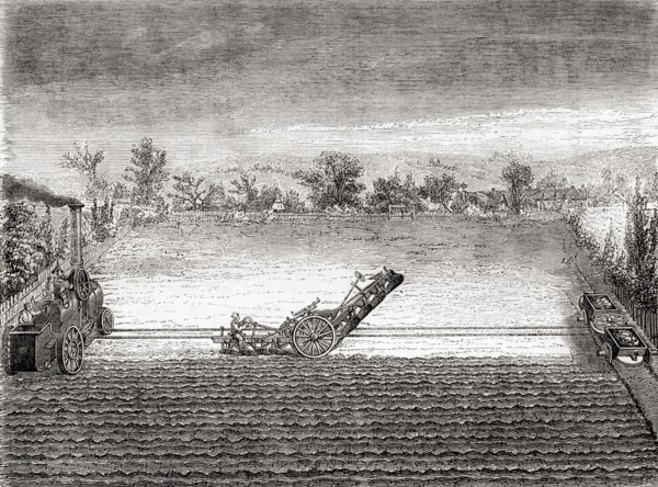 A steam driven traction engine and a multi bladed plough designed by John Fowler in the 19th century.