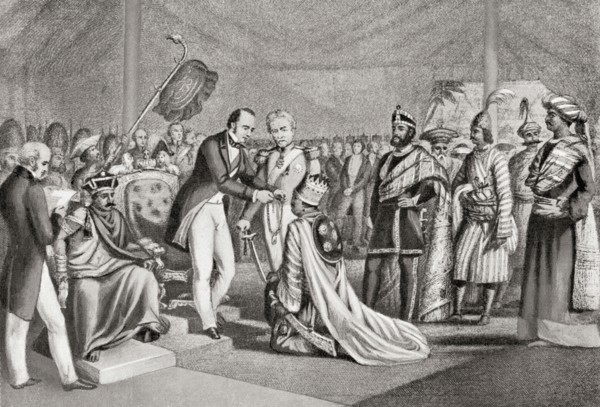 The Rajas of Rewa, Benares and Chikari being decorated for their loyalty to the English during the Indian Mutiny by Lord Canning at Cawnpore in 1859.