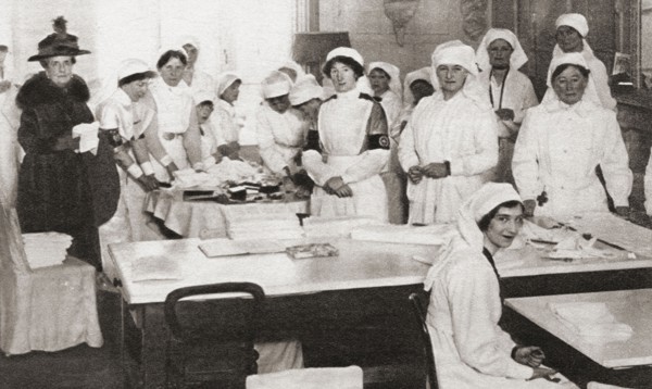 Women volunteers making bandages and crutches during WWI.