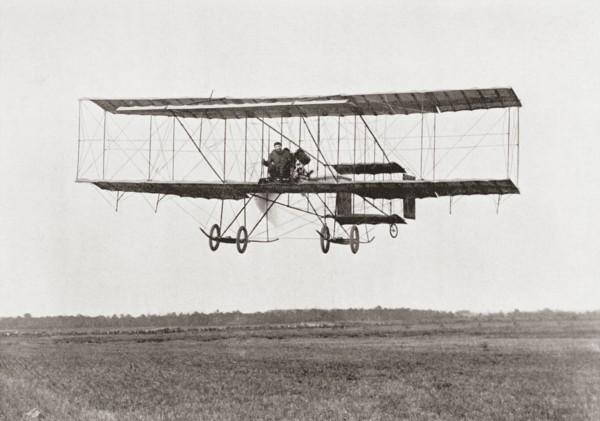 Henri Farman winning the Grand Prix of two thousand pounds for the longest flight of 112 miles in a Farman III Biplane.