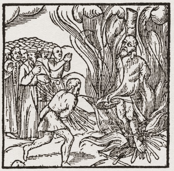 A heretic being burnt at the stake during the Tudor period in England.