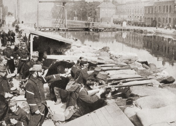 Belgian soldiers defending the sandbagged Willebrock Canal from the advancing Germans during WWI.