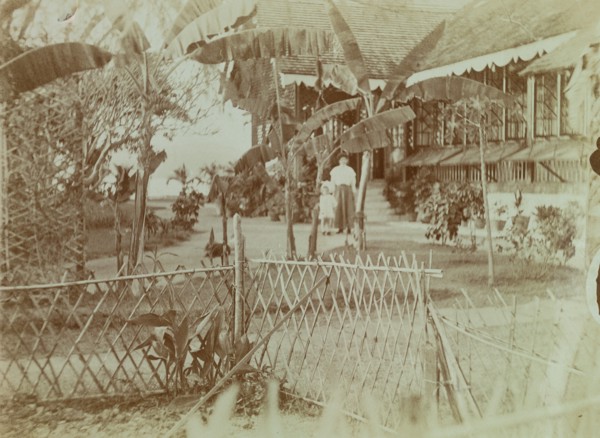 View of Marjory and Anne Wood standing in their garden