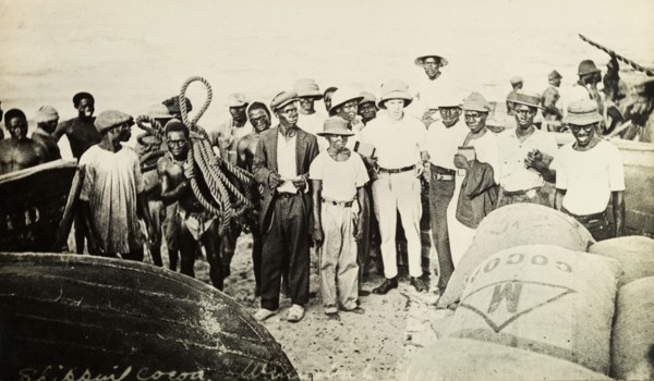 Mr Tamlin and workers on the beach