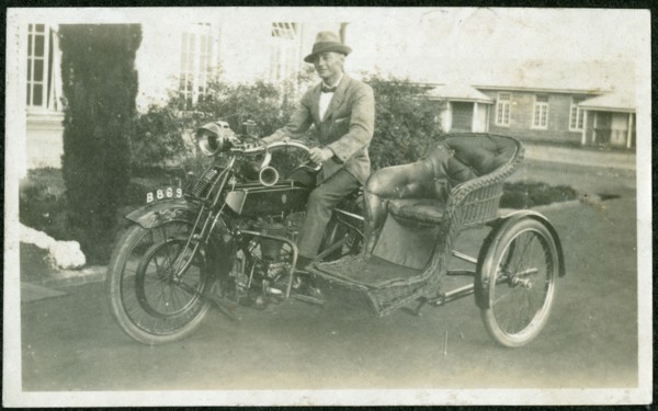 Bertie Rand on a motorbike outside the Nairobi Police Depot