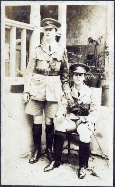 Portrait of European women dressed up in army uniforms