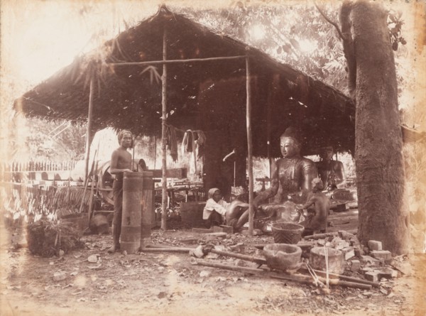 Burmese craftsmen making Buddha sculptures