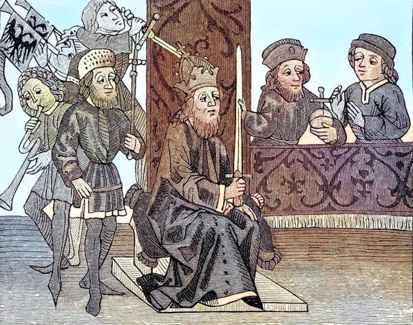 Burggraf Friedrich kneels in front of the Emperor and holds the fief flag that has just been received.