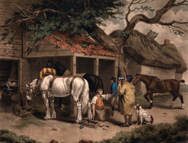 The blacksmith in his forge with a horse to be shod.