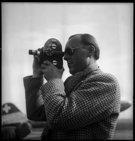 Prince Bernhard of the Netherlands holding a hand camera, Dvºbendorf 1946.
