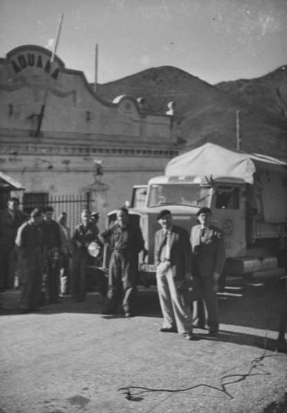 Swiss truck, driver at the customs; 1944.