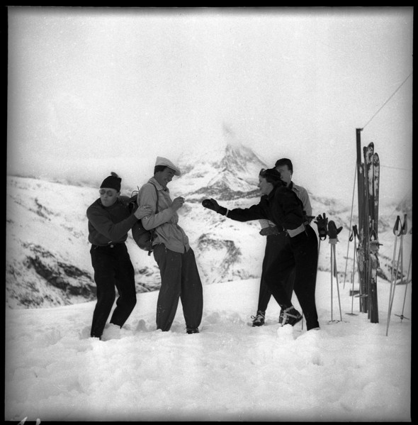 Prince Bernhard (l) takes cover during a snowball fight, 1947.