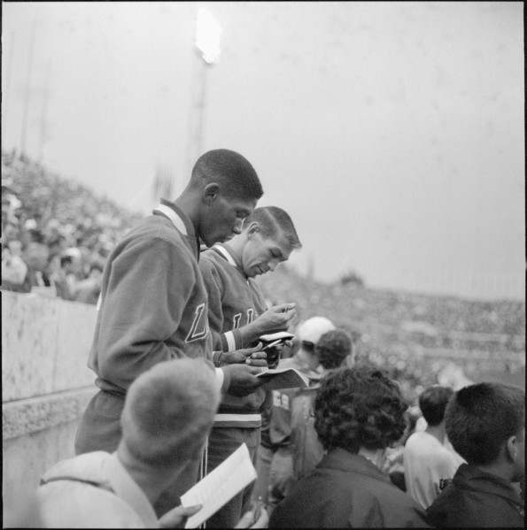 Rome 1960: Otis Davis and Glenn Davis signing autographs.