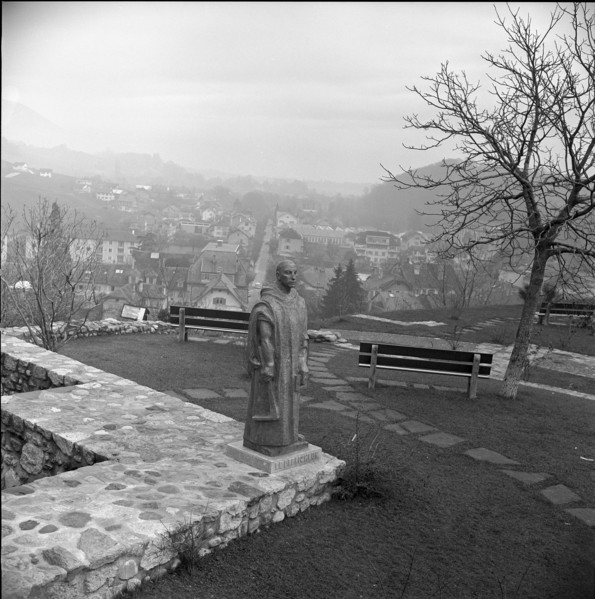 Statue of a monk Le Defricheur at Boudry Castle, 1960.