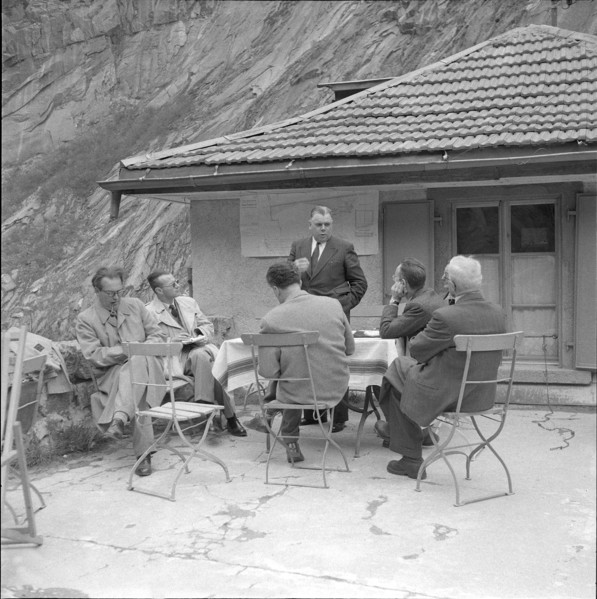 Engineer explaining details on the construction of a bridge in the Schöllenen ravine,  1955.