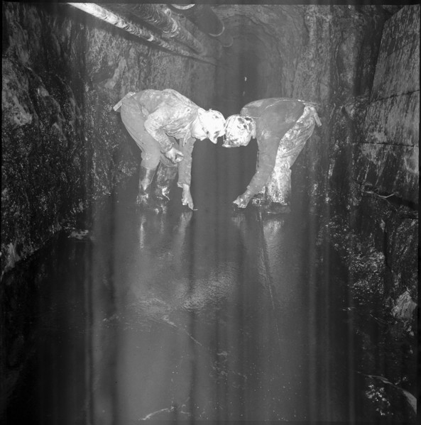Geologists analysing shaft, Oil deposit. 1964