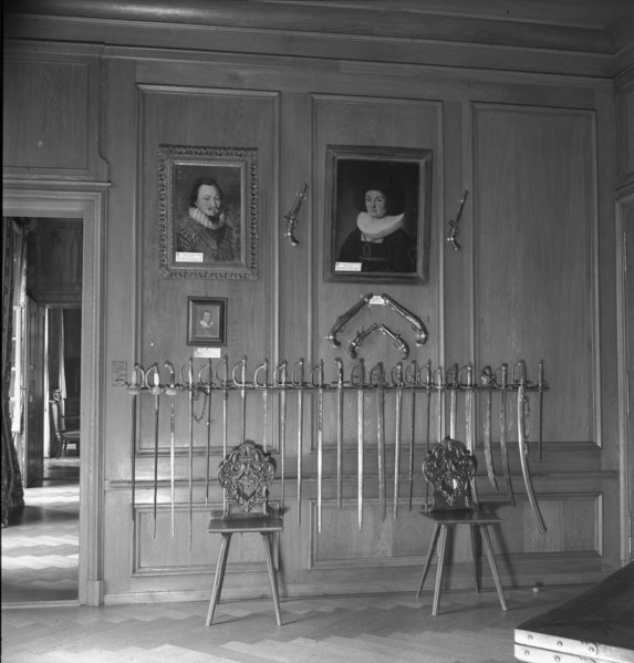 Sabres on a wall at Jegenstorf Castle, around 1955