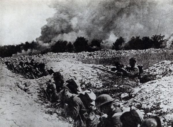 The caption on this photo that dates to the early 1920s reads: Americans in shell holes in No Man's