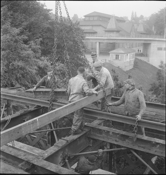 Construction worker demolishing a railway bridge 1941.