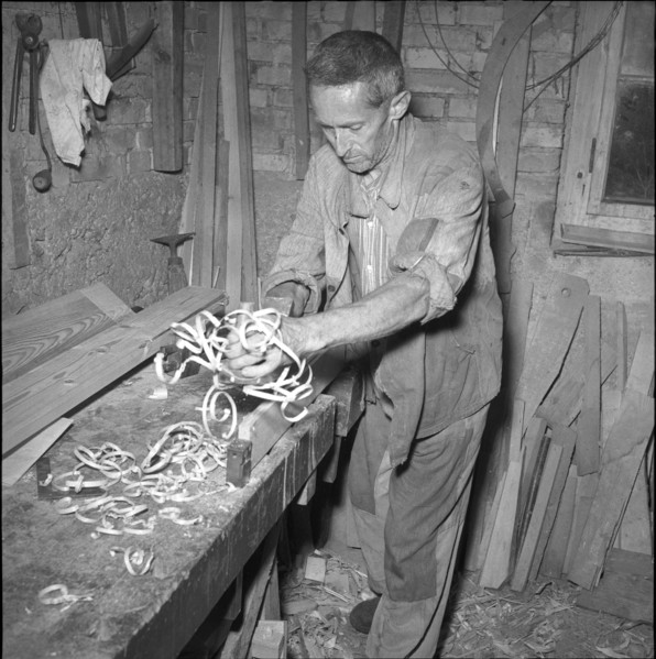 Alpthal; carpenter in his workshop; 1951.