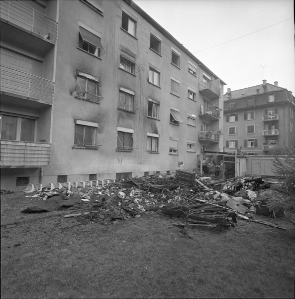 Fire causes explosion of gas bottle in barrack, Zurich 1961.