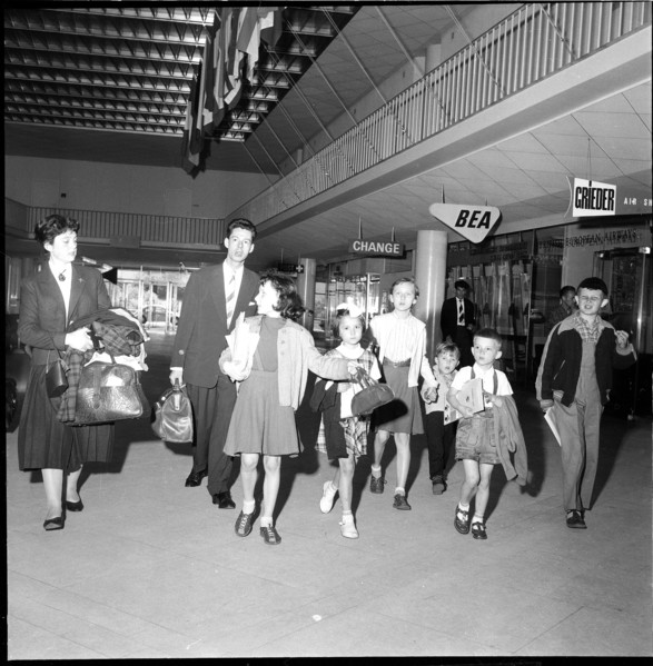 Gerold Zust with Hungarian children at airport Kloten 1957.