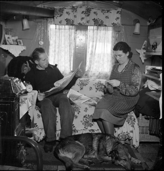 Yenish couple in living room, 1942.