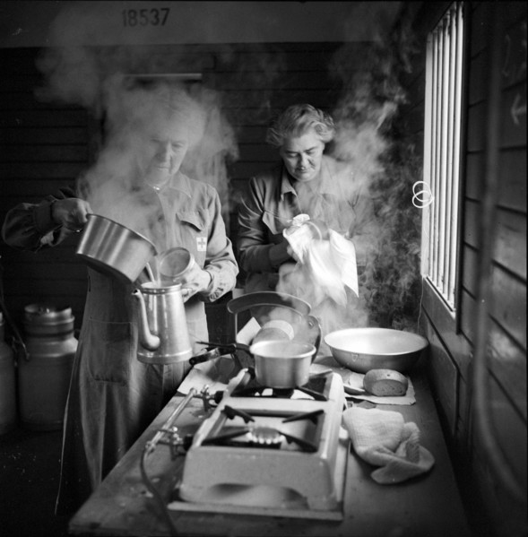 Refugee train from Hungary, aid workers in kitchen 1956.