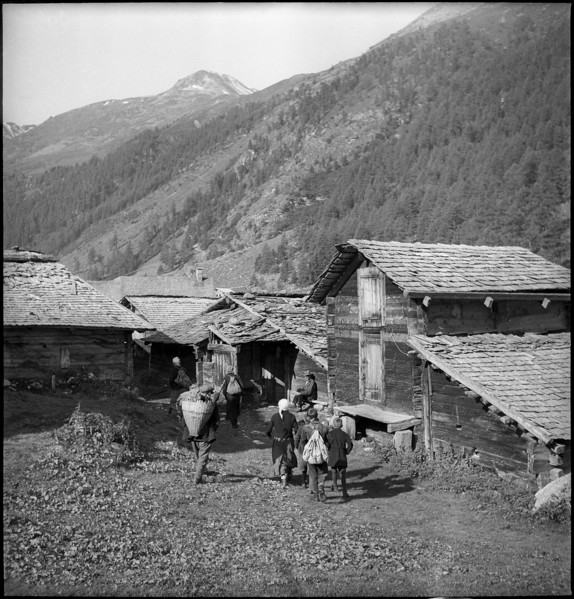 Farmers meet for cheese donation in the Turtmanntal valley, Switzerland, 1940.