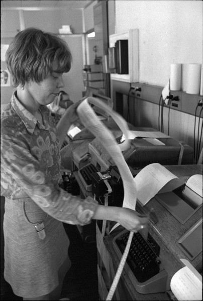 UPI office, telexist at telex terminal, 1970.
