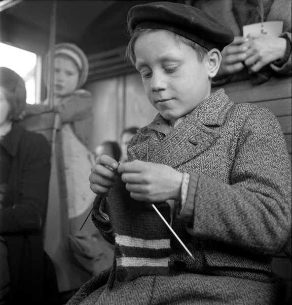 Boy knitting