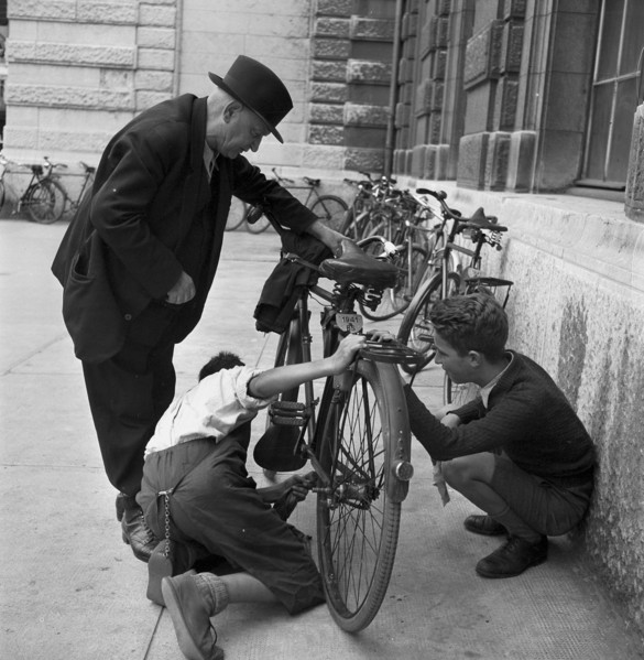 Basel, boys offer cleaning of bicycles; 1941