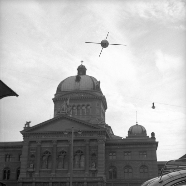 Self-made toy satellite with lettering Tell CH; Federal Parliament