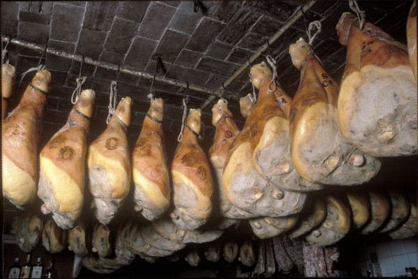 Raw ham on a market stall 1987