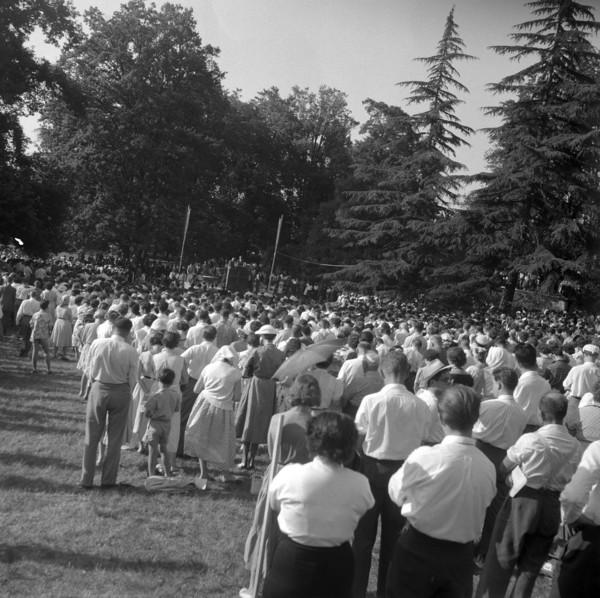 Audience listening to Baptist preacher Billy Graham in Geneva, 1955