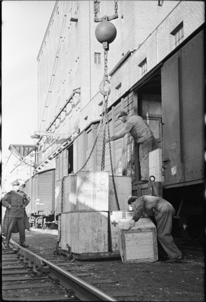 Loading goods from the Red Cross dutyfree warehouse in Basel, 1944