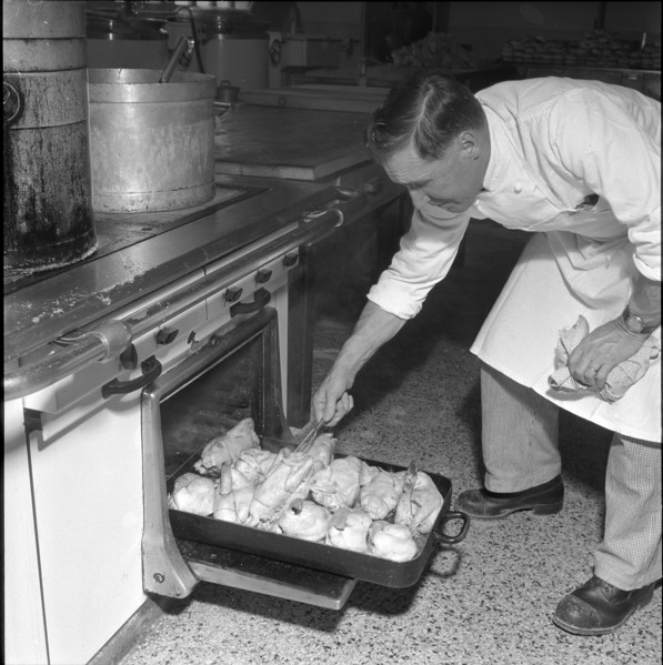Grande Dixence, construction site cook at the oven 1957