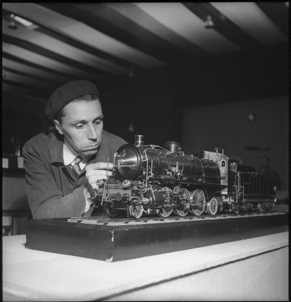 Man with Model of Locomotive