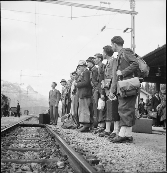 Apprentices waiting for train; 1943