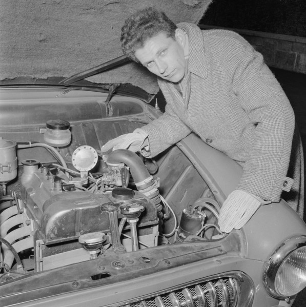Inventor with gaspowered car, 1956