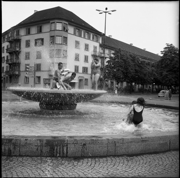 Children playing in a fountain in Zurich, 1967.