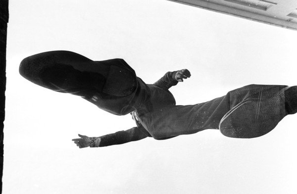 Man standing on glass, photographed from underneath, 1969.