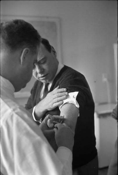 Blick employee getting vaccination against influenza, 1968.
