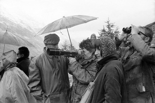 Mattmark glacial ice avalanche, relatives follow the  search for missing workers; 1965.