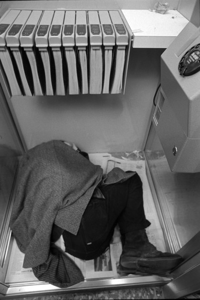 Sleeping homeless person in Zurich's shopville, 1971.