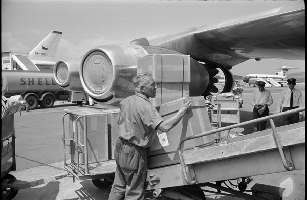 Loading an aeroplane, airport Zurich-Kloten 1966.