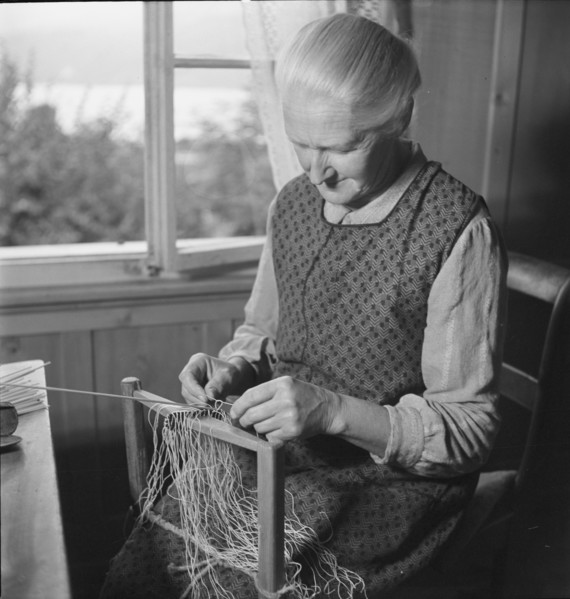Woman braiding straw, 1940.