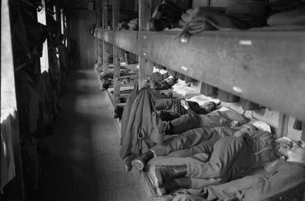 Soldiers sleeping in military barrack S-chanf 1969.